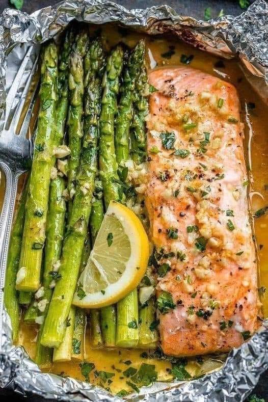 Thumbnail for Baked Salmon in Foil with Asparagus and Garlic Lemon Butter Sauce
