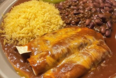 Thumbnail for Two Cheese Enchiladas with Chile Con Carne Sauce